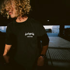 “LIGHT IN THE DARK” SILVER REFLECTIVE TEE